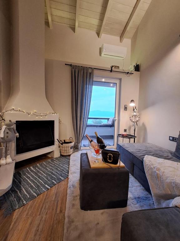 A seating area at Vrachos Suites