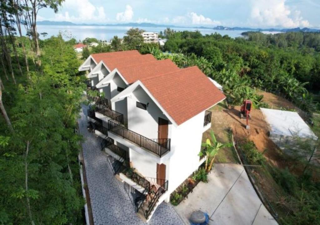 an overhead view of a house with a roof at White Seaview Residence in Klong Muang Beach