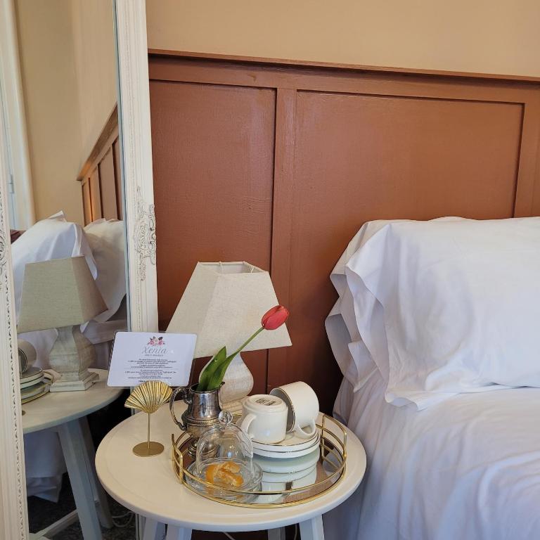 Postel nebo postele na pokoji v ubytování Joy's Bnb Ortigia