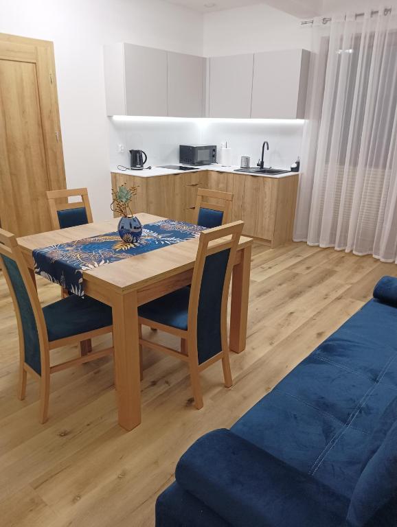 Kuchyň nebo kuchyňský kout v ubytování Apartamenty Bianka