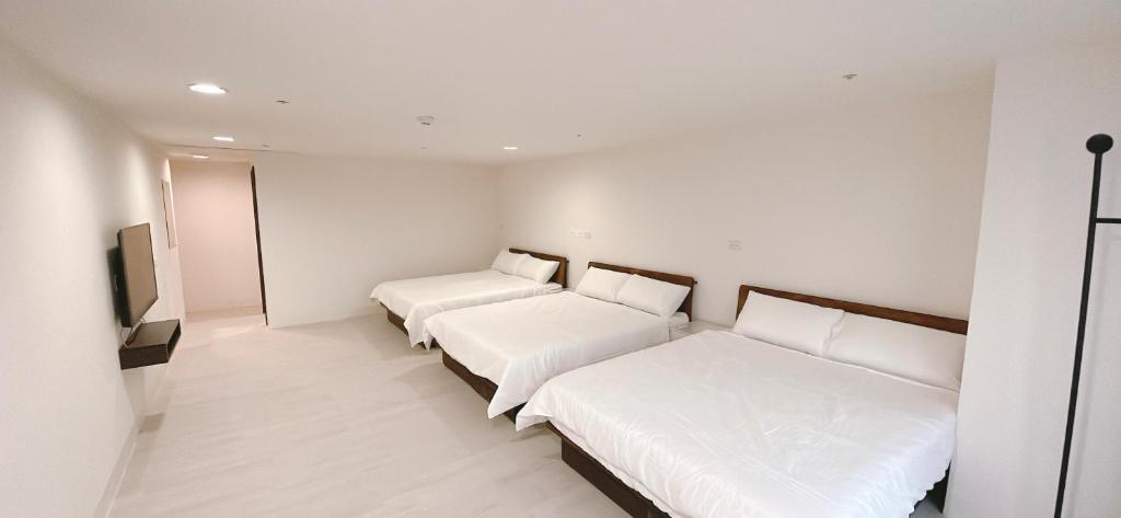Voodi või voodid majutusasutuse 三弄旅宿3rd Alley Inn toas