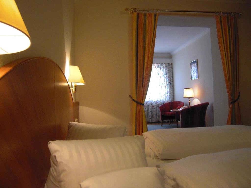 Postel nebo postele na pokoji v ubytování Seehotel Ressmann