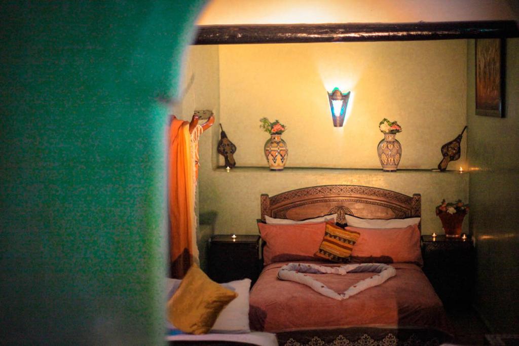 Postel nebo postele na pokoji v ubytování Riad Douja