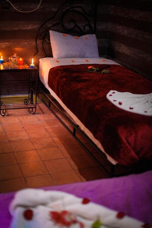 Postel nebo postele na pokoji v ubytování Riad Douja