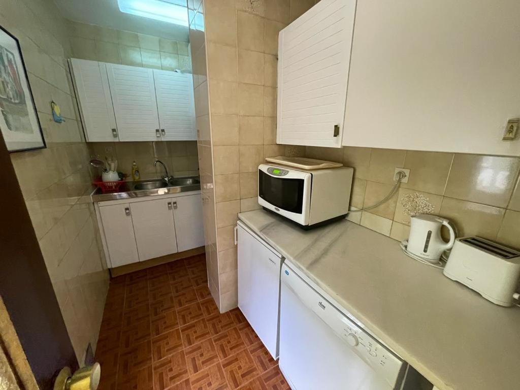 Kuchyň nebo kuchyňský kout v ubytování Immodelpas Consuegra 1