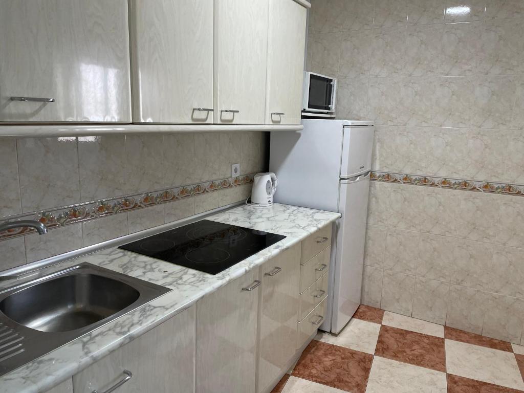 Kuchyň nebo kuchyňský kout v ubytování Edif Casablanca