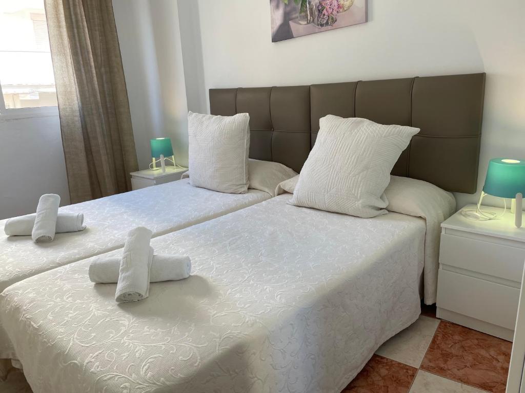 Postel nebo postele na pokoji v ubytování Edif Casablanca