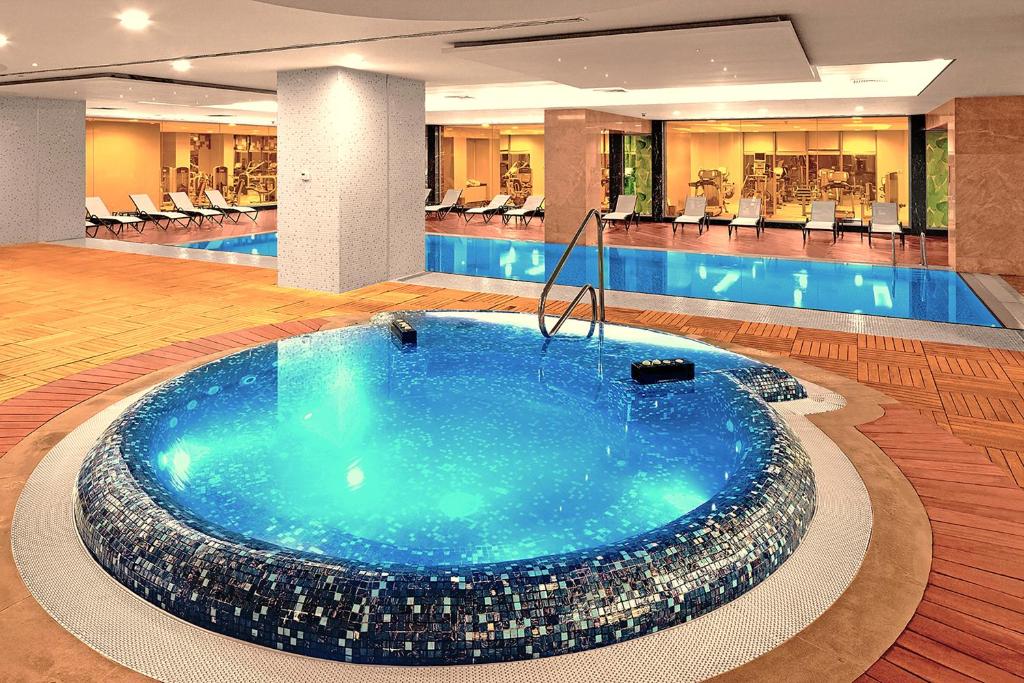 The swimming pool at or close to The Green Park Pendik