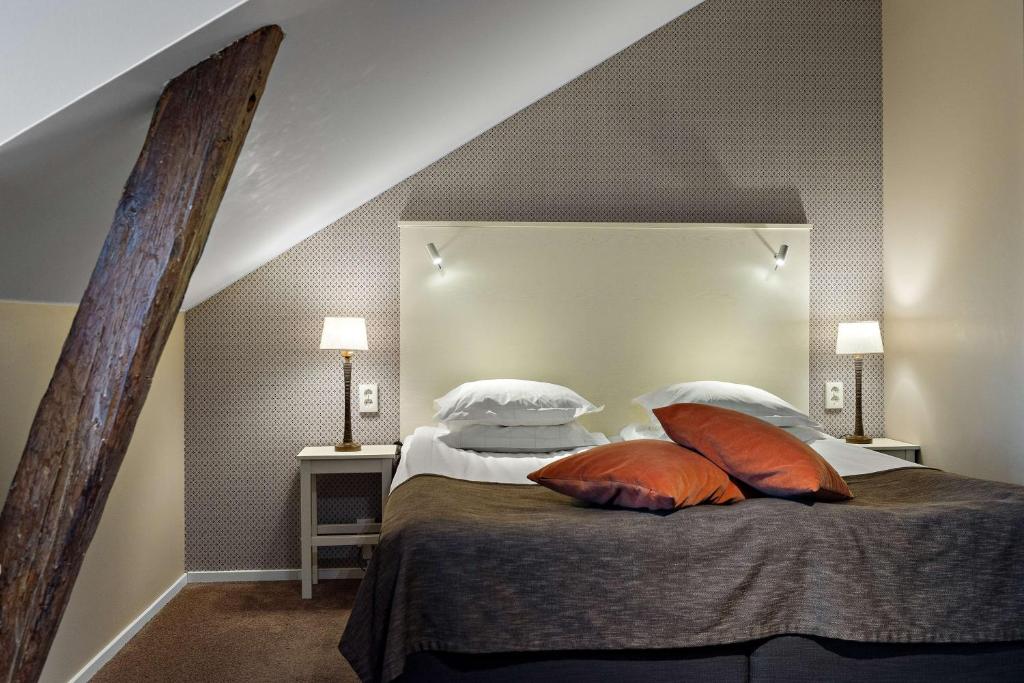 Postel nebo postele na pokoji v ubytování Best Western Plus Edward Hotel