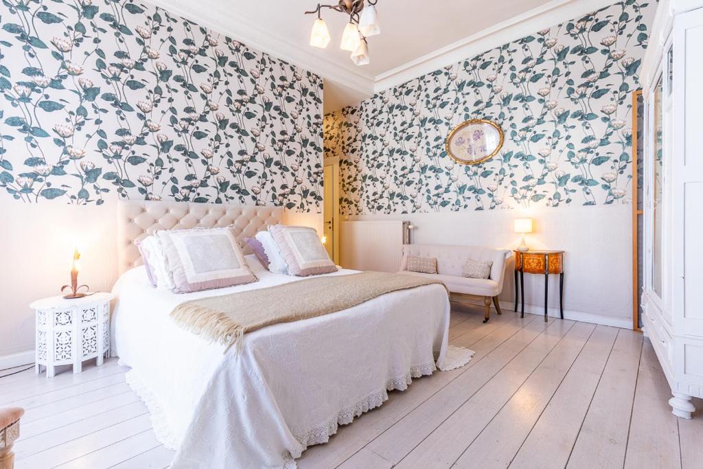 Postel nebo postele na pokoji v ubytování B&B Yasmine Brugge