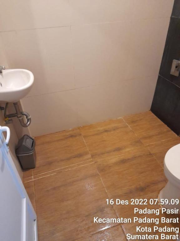 Koupelna v ubytování Hotel Alifa Syariah