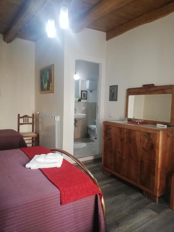 Łóżko lub łóżka w pokoju w obiekcie B&B Parva Domus