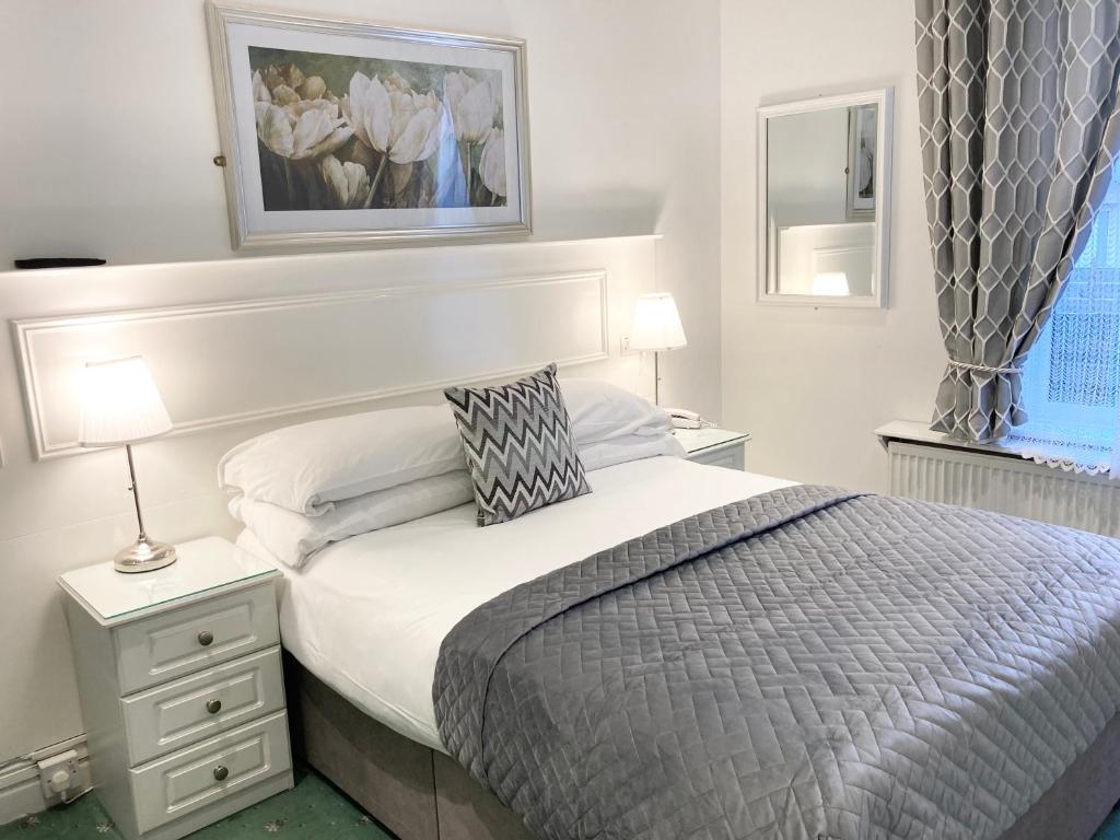 Krevet ili kreveti u jedinici u okviru objekta Dergvale Hotel
