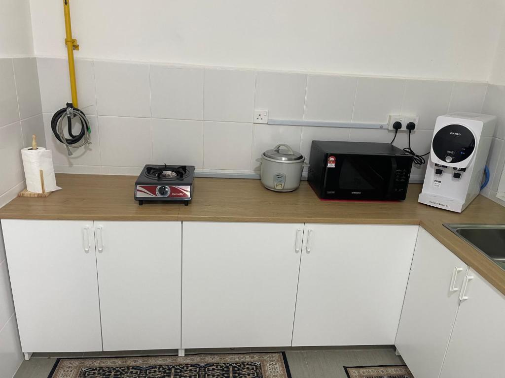 Kuchyň nebo kuchyňský kout v ubytování Double AS Homestay