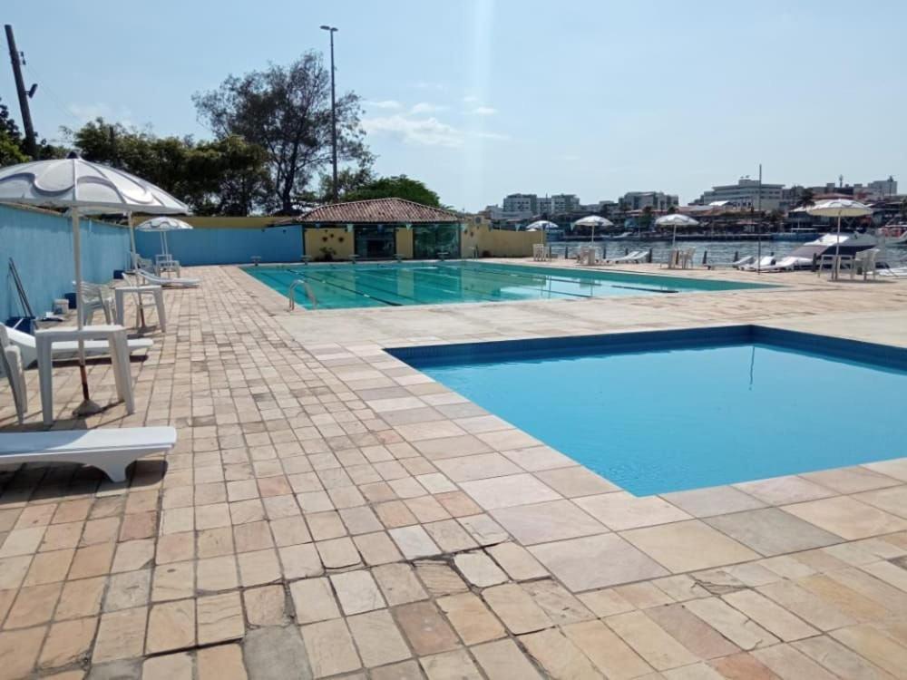 Bazén v ubytování Cabo Frio - Costa Azul Iate Clube - Aluguel Econômico nebo v jeho okolí