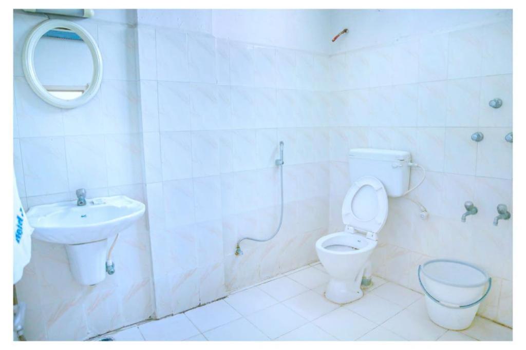 Koupelna v ubytování Hotel Jeyasakthi