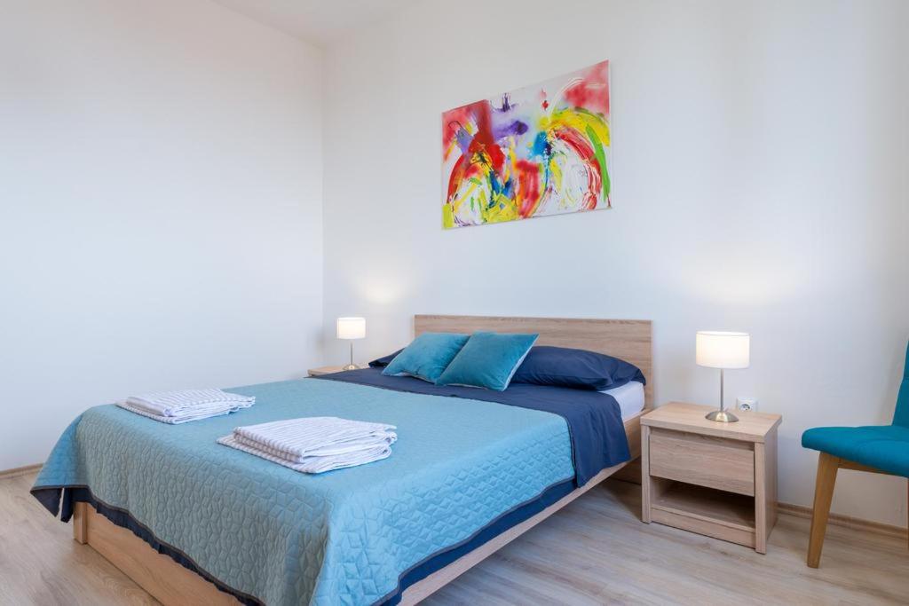 Posteľ alebo postele v izbe v ubytovaní Dubrovnik SEA VIEW MAGNOLIA APARTMENTS