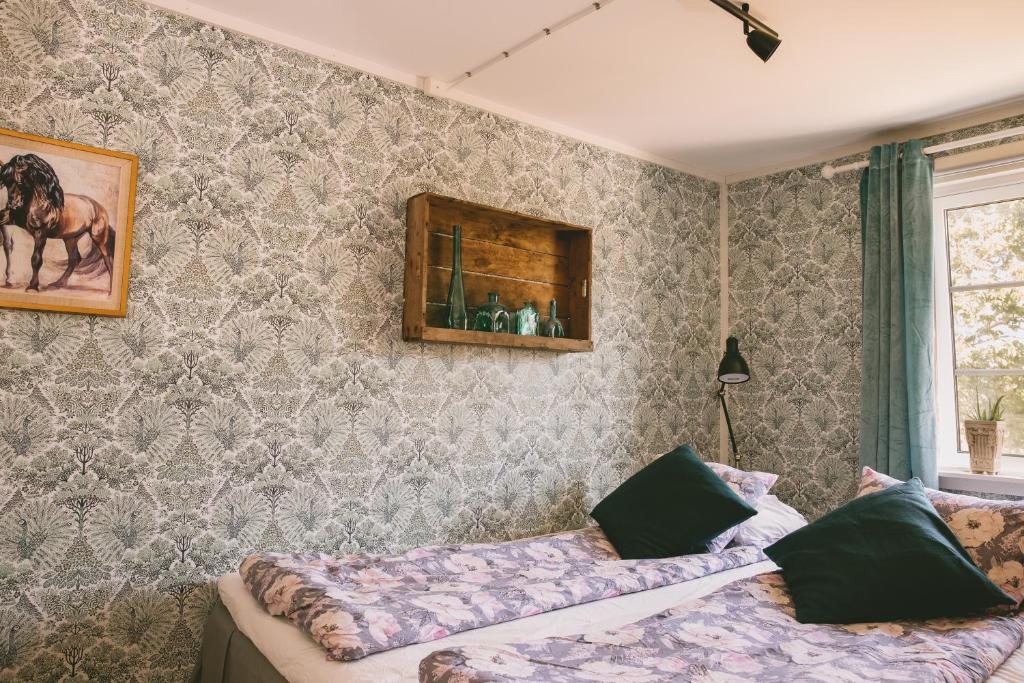 Postel nebo postele na pokoji v ubytování Toric Farmlodge