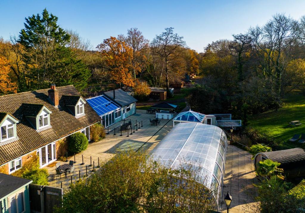 an overhead view of a house with a greenhouse at Rivendell Park in Wimborne Minster