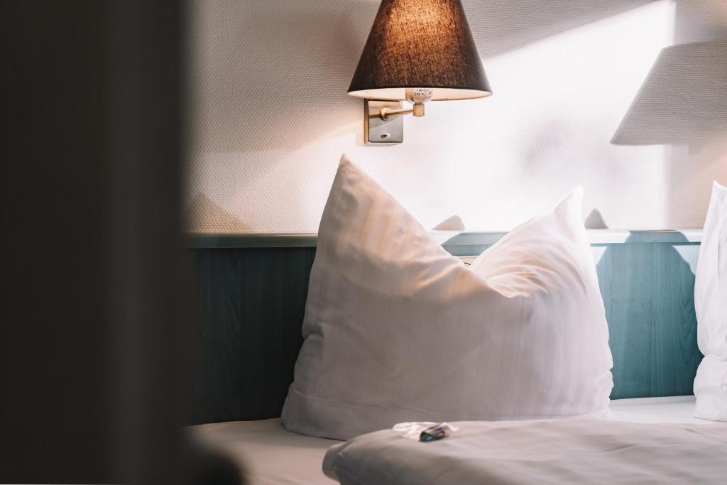 Postel nebo postele na pokoji v ubytování Auszeit Hotel Hamburg