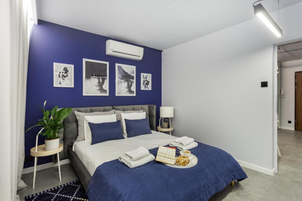 Posteľ alebo postele v izbe v ubytovaní Family Center Apartments