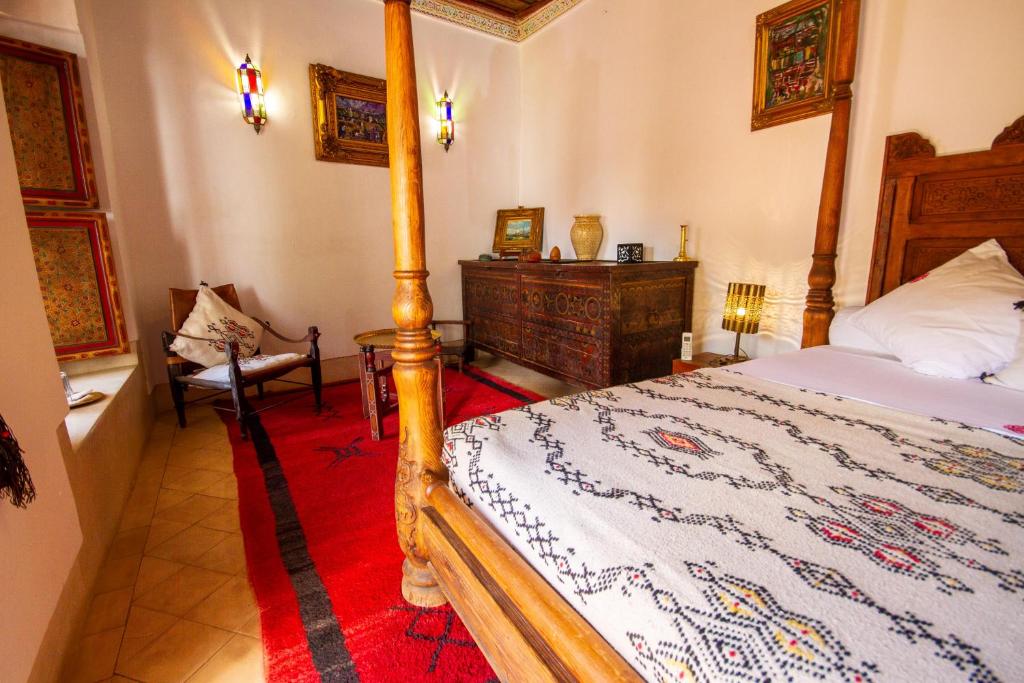 Postel nebo postele na pokoji v ubytování Riad Dombaraka