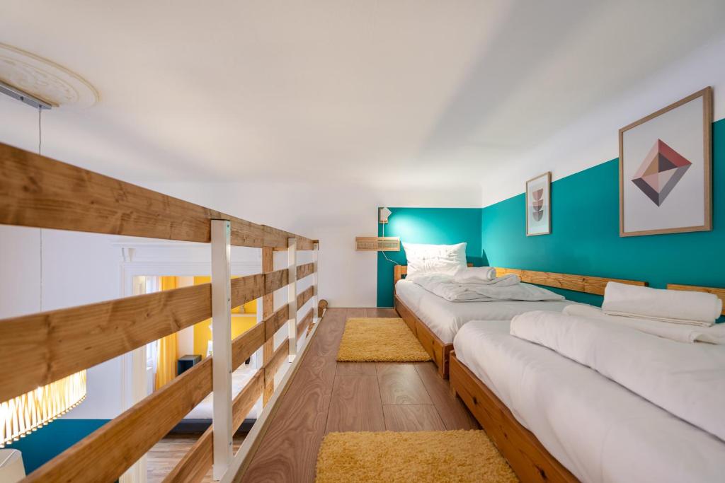 Posteľ alebo postele v izbe v ubytovaní Live Star Apartment
