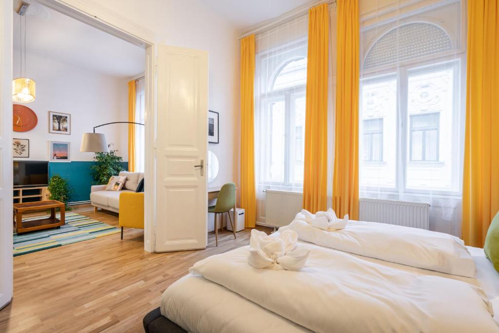 Posteľ alebo postele v izbe v ubytovaní Live Star Apartment