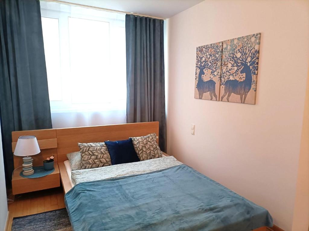Posteľ alebo postele v izbe v ubytovaní Rental Apartment Trębacka
