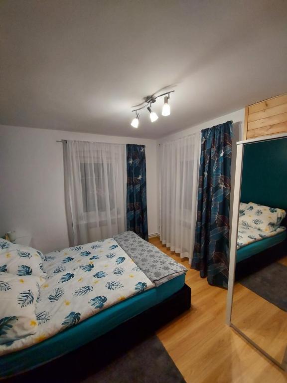 Posteľ alebo postele v izbe v ubytovaní Mieszkanie 44 w Karkonoszach