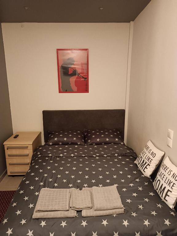 Postel nebo postele na pokoji v ubytování Giorgos studio Trikala