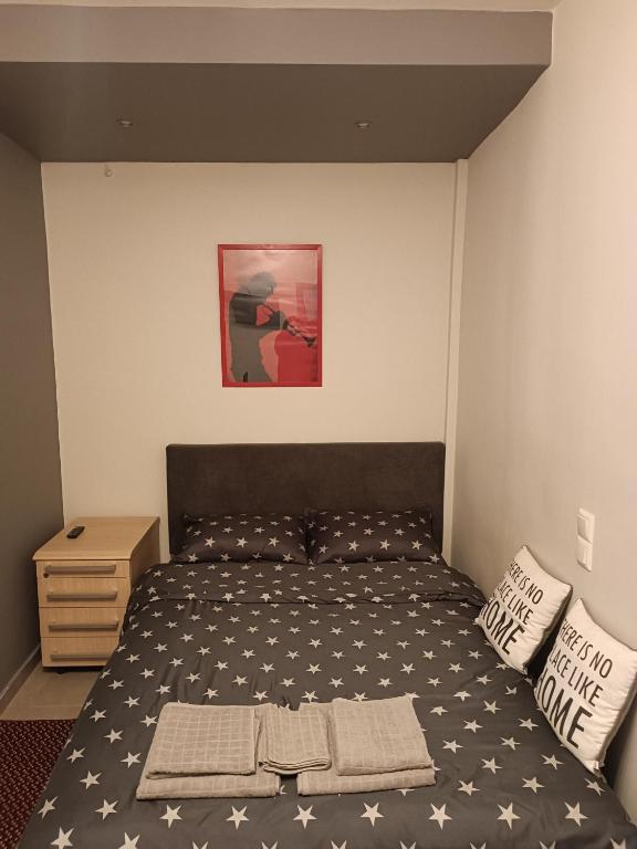 Postel nebo postele na pokoji v ubytování Giorgos studio Trikala