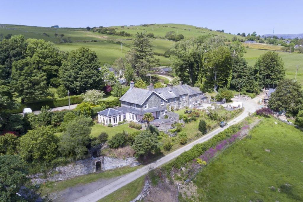 an aerial view of a large house in a field at Eisteddfa in Criccieth