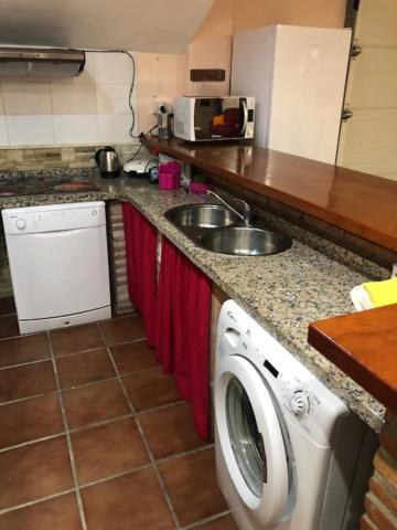 Kuchyň nebo kuchyňský kout v ubytování Ideal loft Malaga