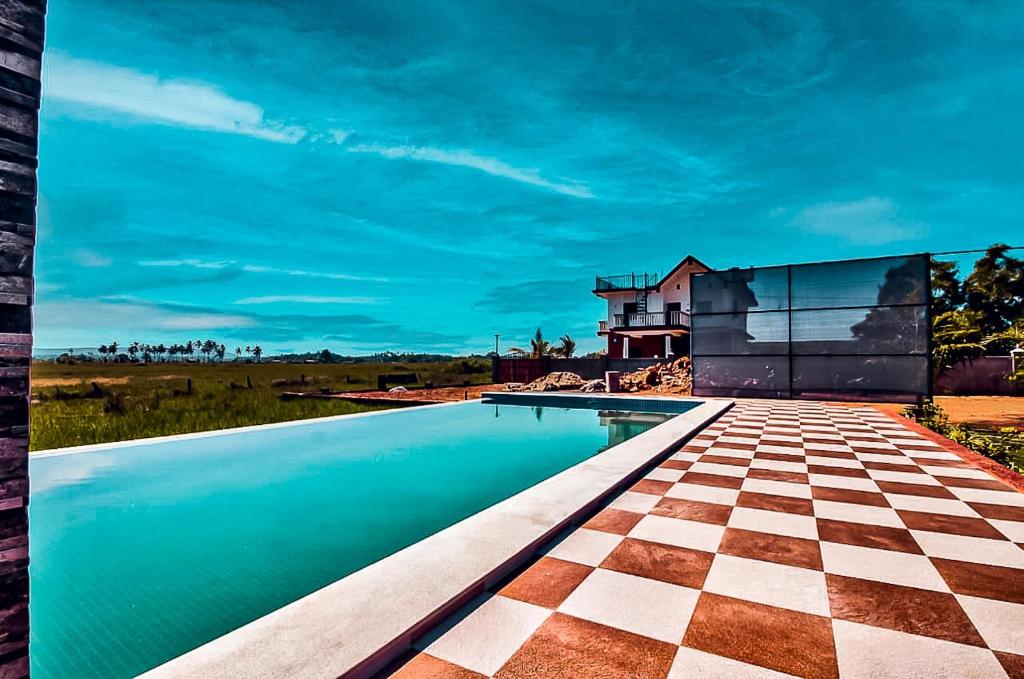 Bazén v ubytování Rofinos Cottages nebo v jeho okolí