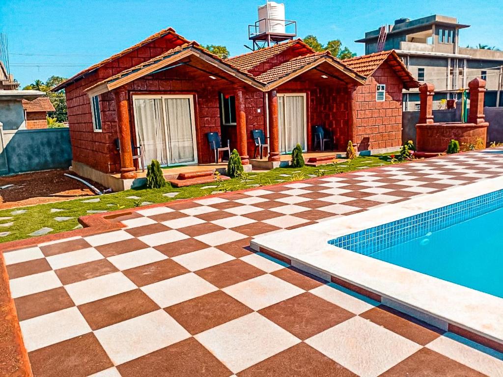 Bazén v ubytování Rofinos Cottages nebo v jeho okolí