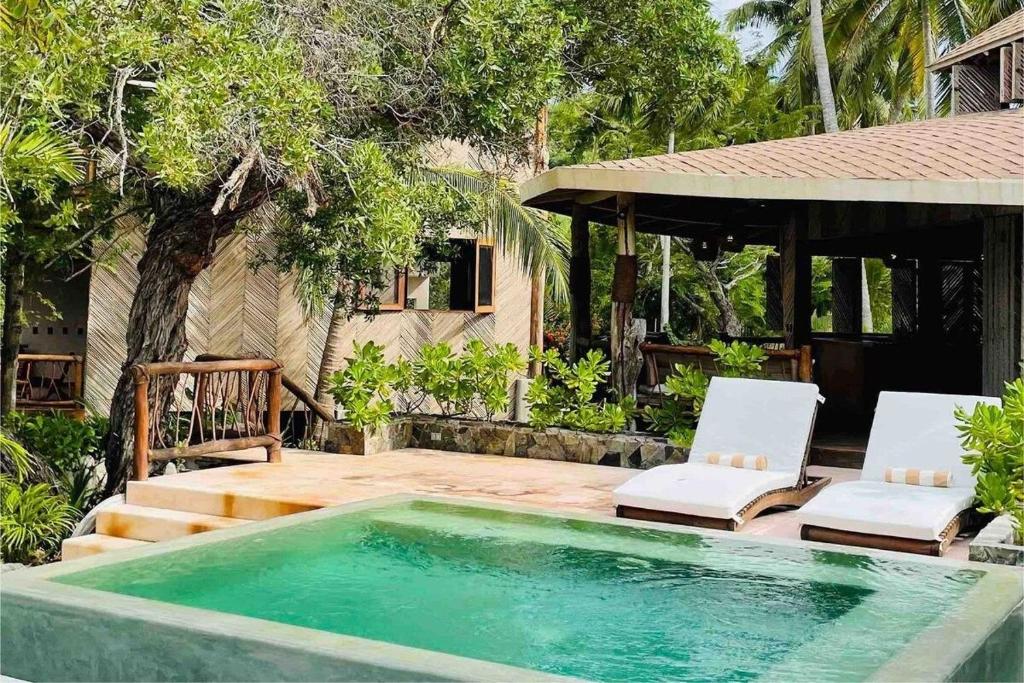 Bazén v ubytování Cabaña junto al mar nebo v jeho okolí