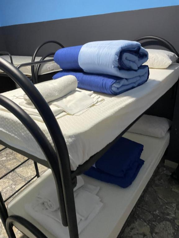 Postel nebo postele na pokoji v ubytování Alexander hostel