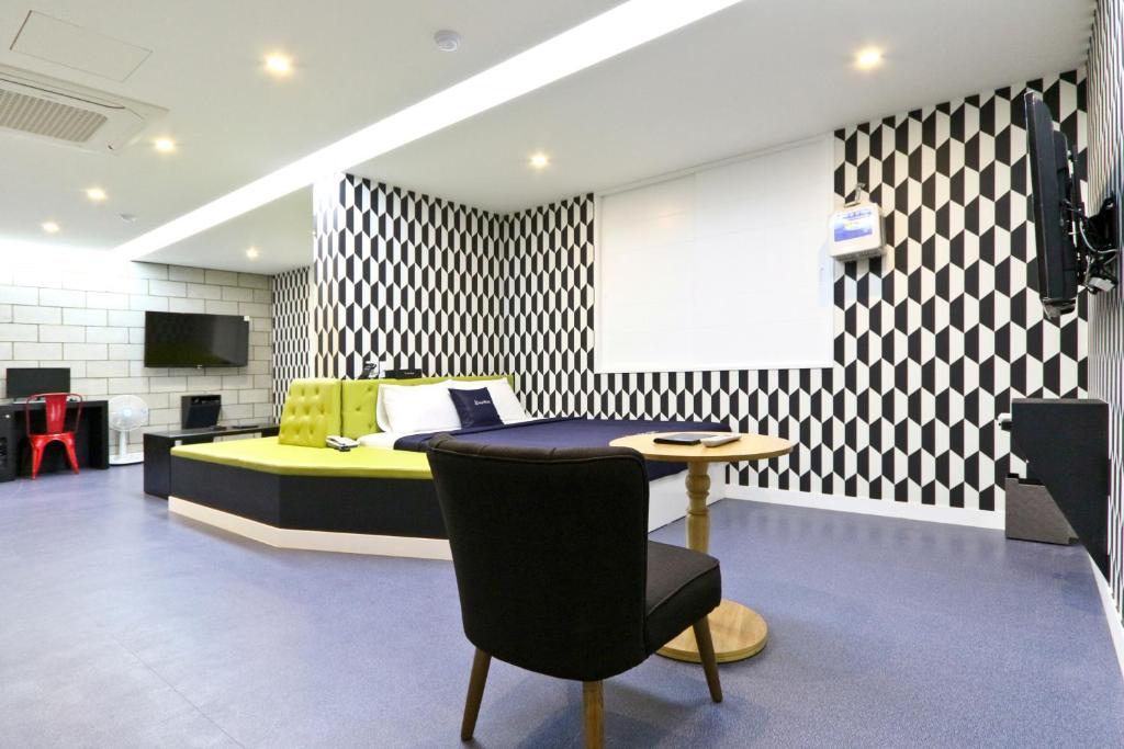 TV a/nebo společenská místnost v ubytování Hotel Home
