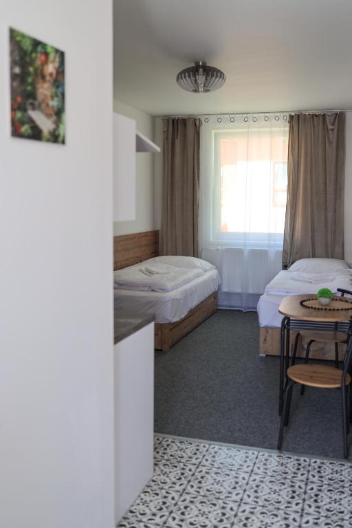 Postel nebo postele na pokoji v ubytování 2 REST
