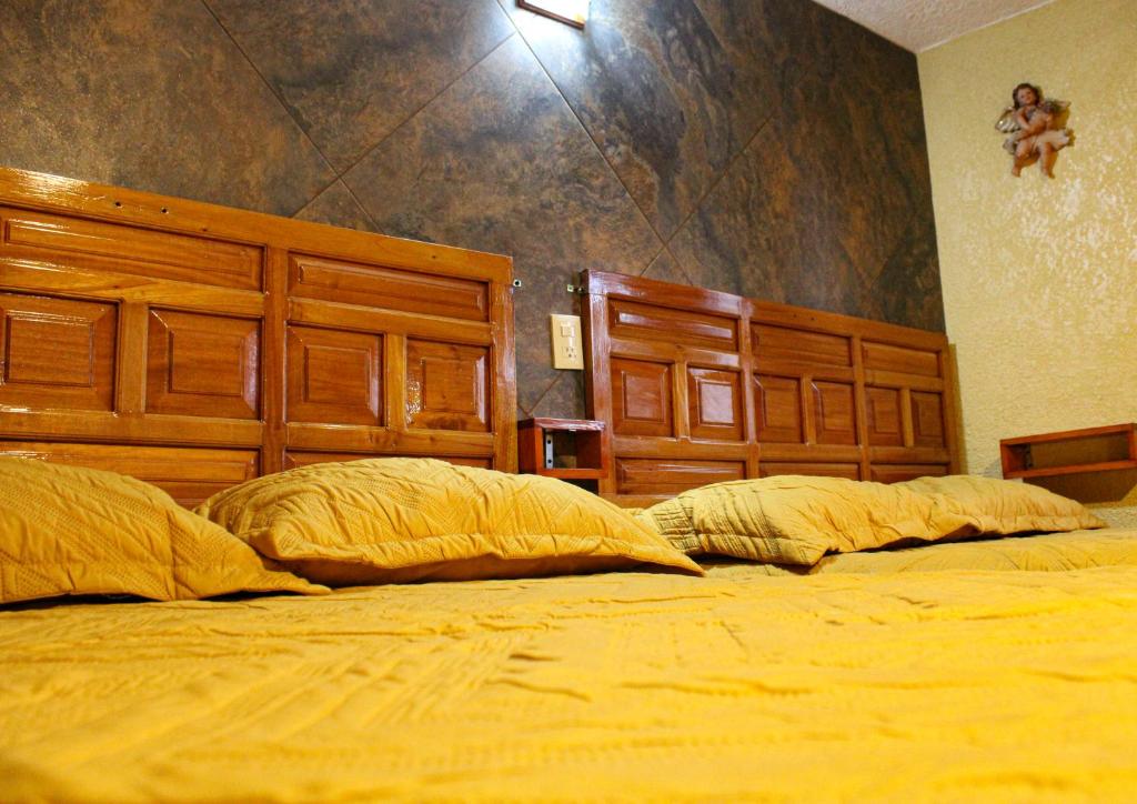 Letto o letti in una camera di Hospedaje Ensueño