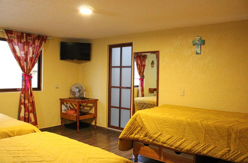 Letto o letti in una camera di Hospedaje Ensueño