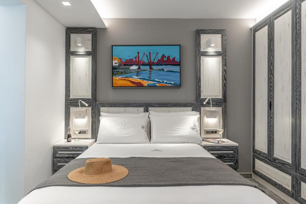 Voodi või voodid majutusasutuse Mariet Naxos Elegant Suites toas