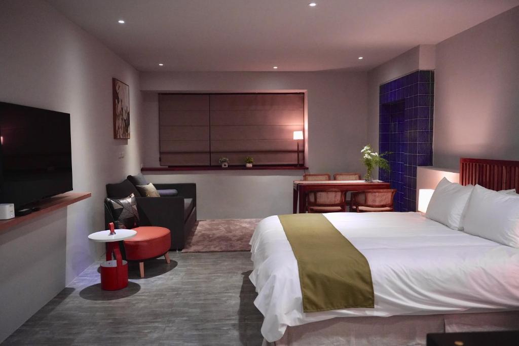 Letto o letti in una camera di The MSUG Hotel