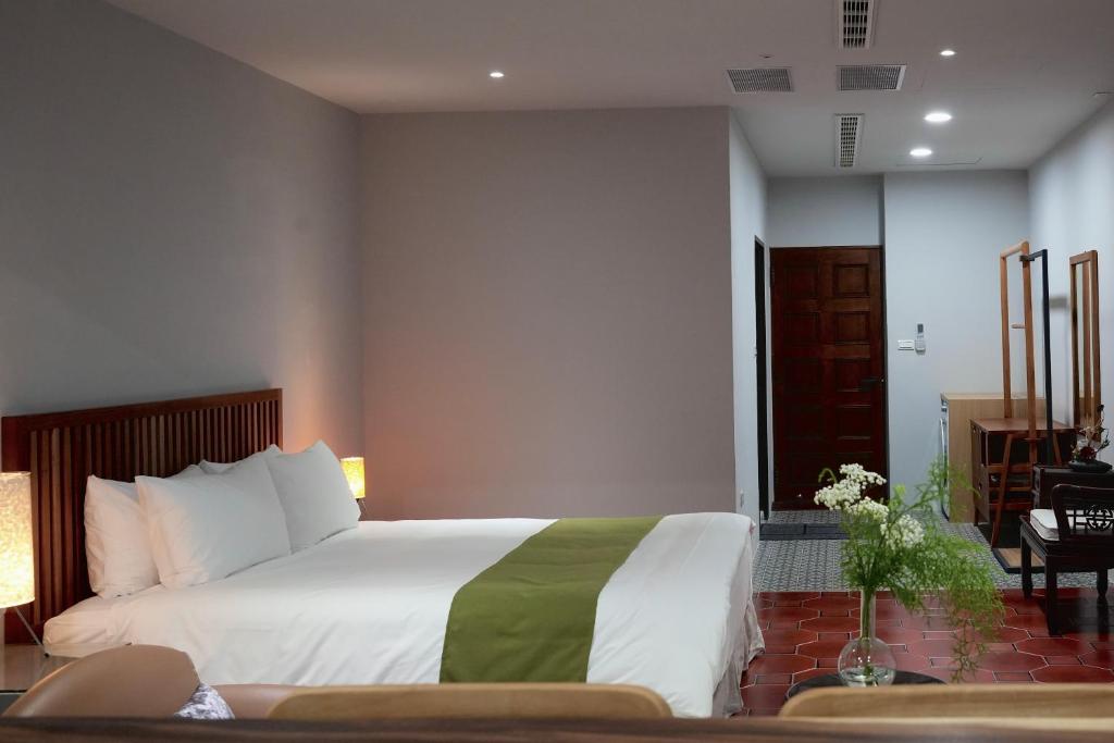 Letto o letti in una camera di The MSUG Hotel