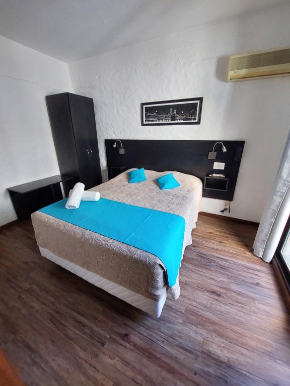 Postel nebo postele na pokoji v ubytování Posada Los Pinos
