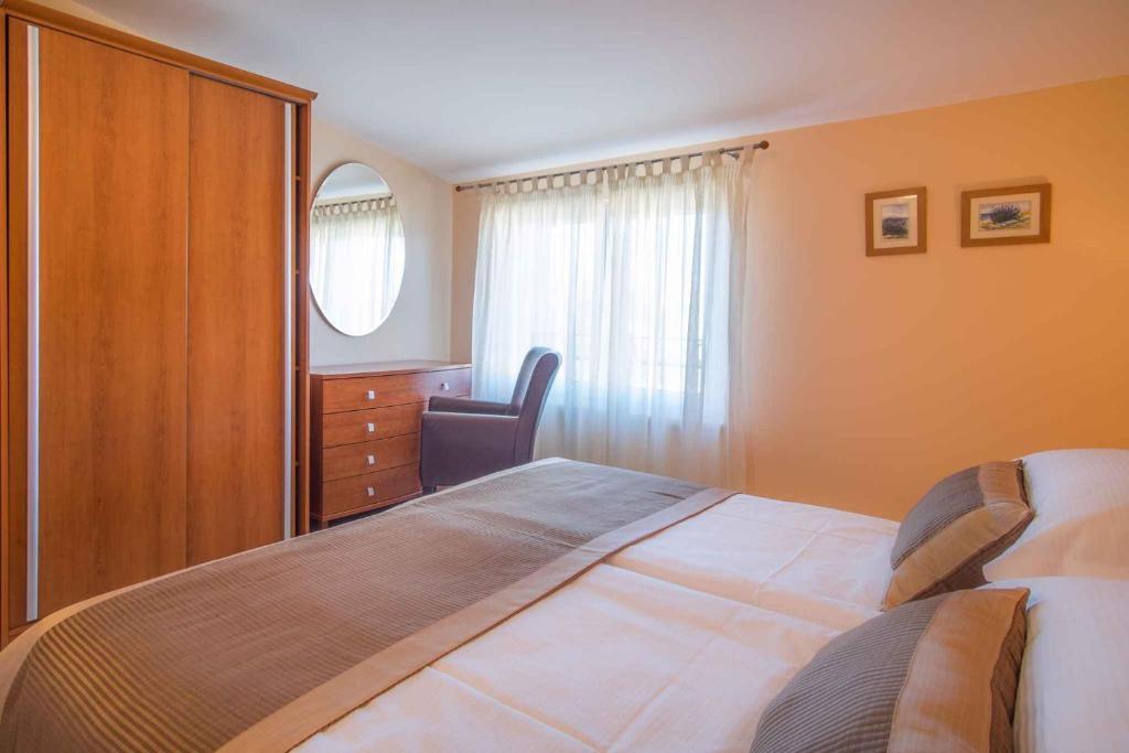 Posteľ alebo postele v izbe v ubytovaní Apartment in Vantacici - Insel Krk 43328