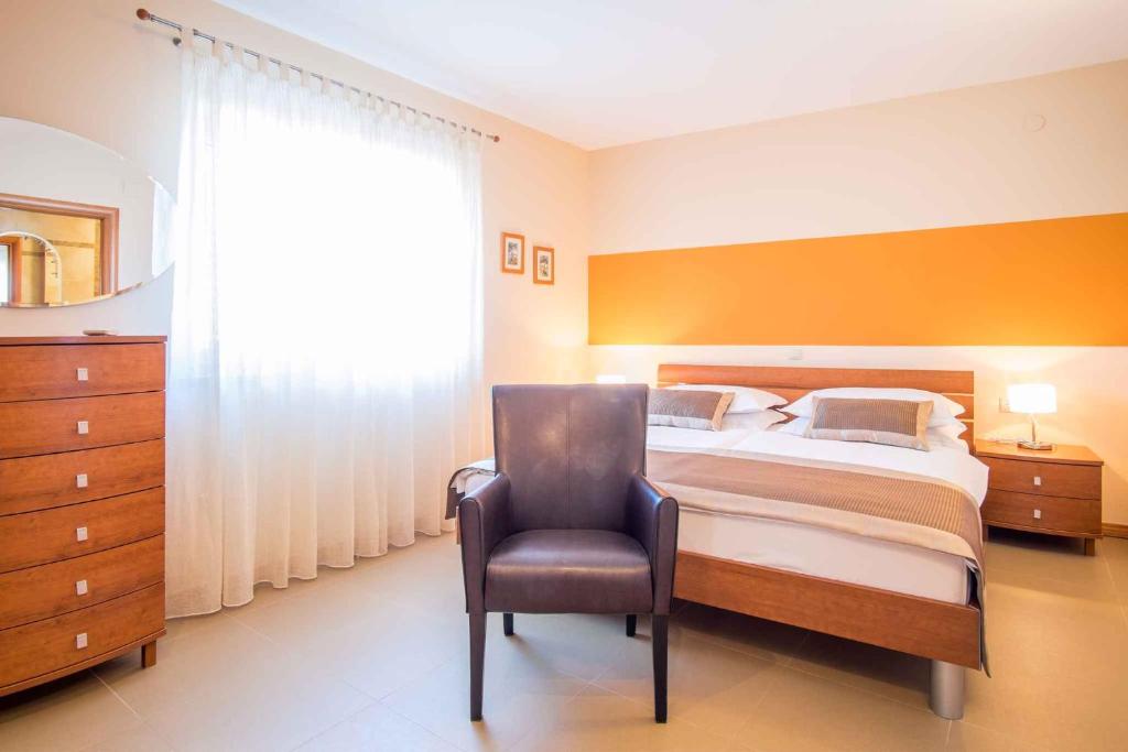Łóżko lub łóżka w pokoju w obiekcie Apartment in Malinska - Insel Krk 43327