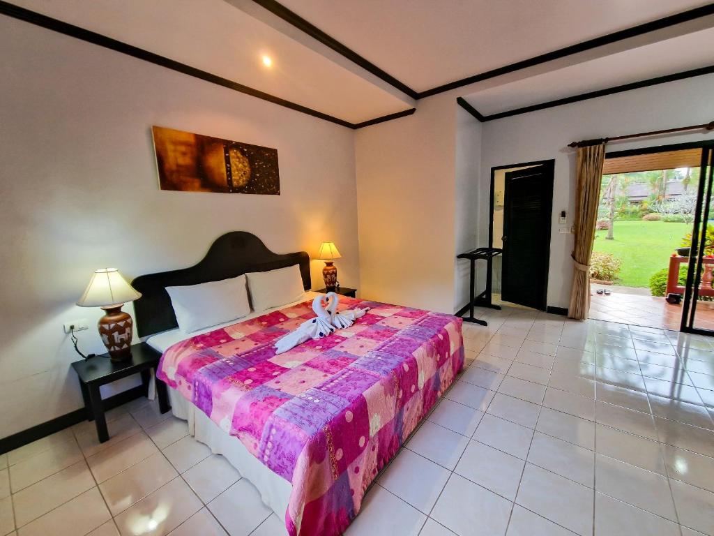 Postel nebo postele na pokoji v ubytování Jasmin Resort - SHA Plus
