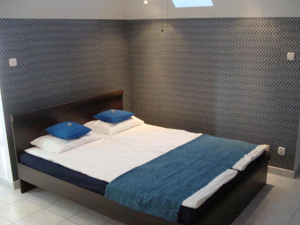 Posteľ alebo postele v izbe v ubytovaní Aqua1000